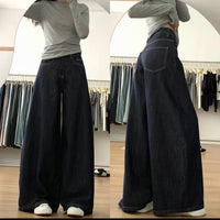 Person wearing wide-leg jeans in a clothing store.