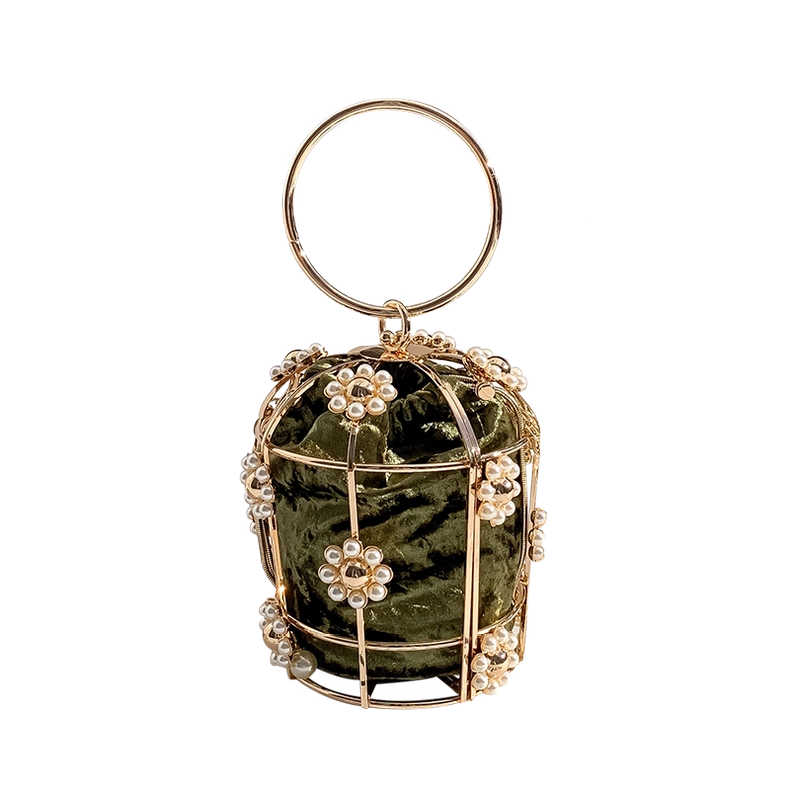 Decorative glass sphere with floral designs and a gold ring on a white background