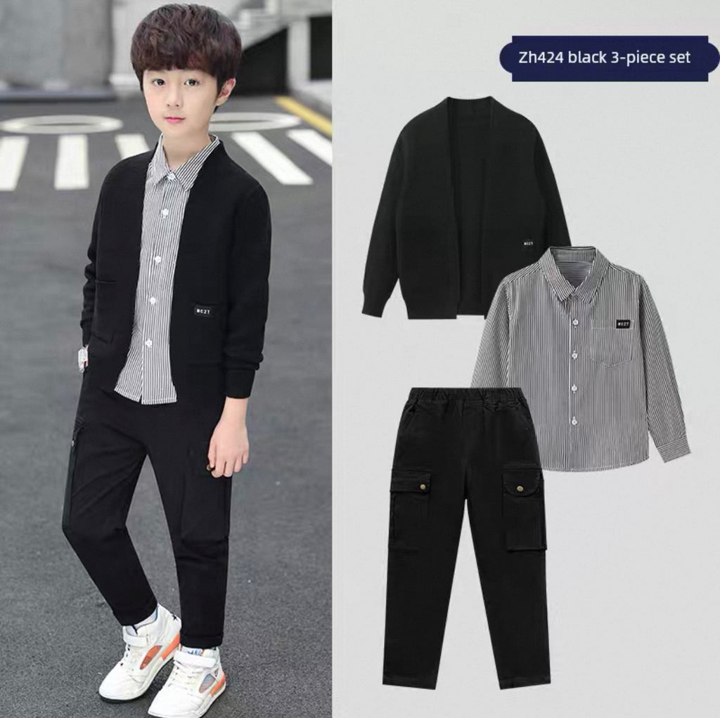 Child wearing a black cardigan, striped shirt, and black pants on a road with an inset showing the clothing set.
