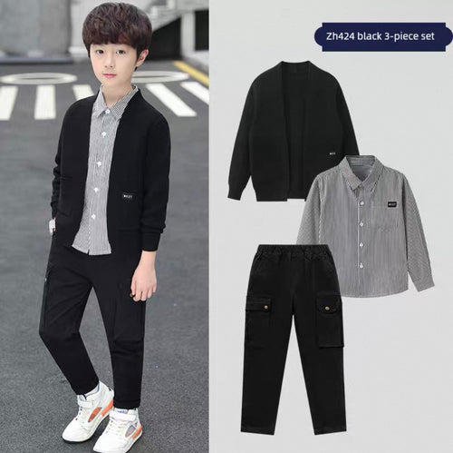Child wearing a black cardigan, striped shirt, and black pants on a road with an inset showing the clothing set.