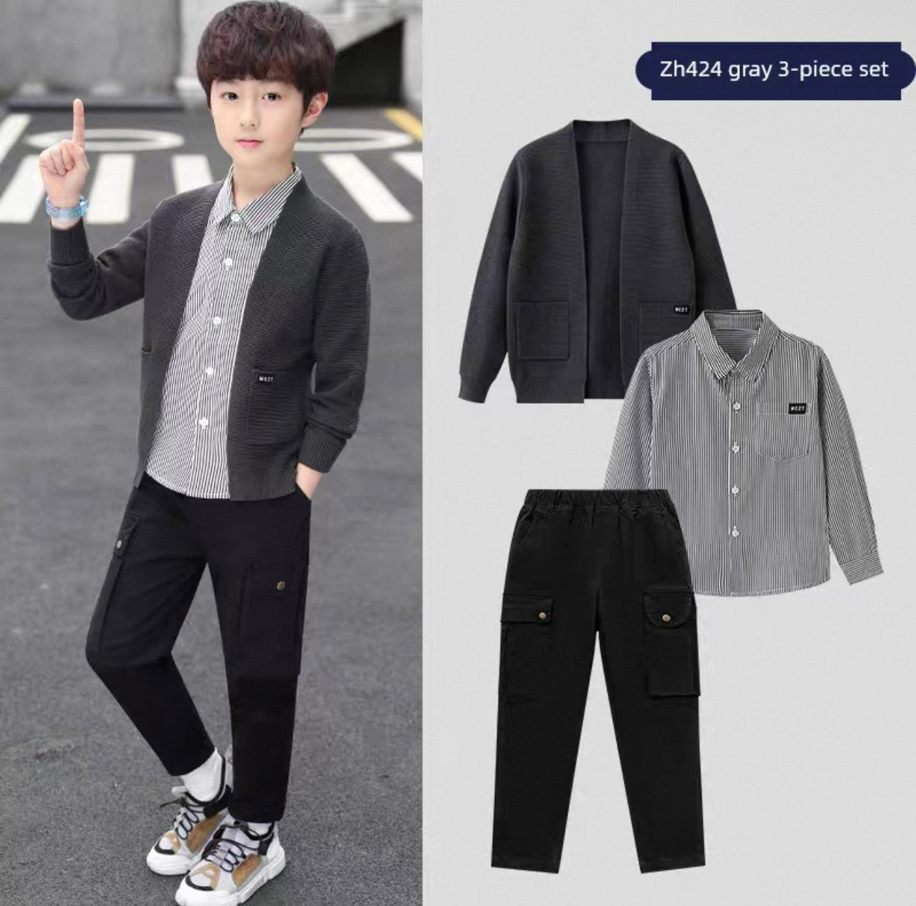 Child wearing a gray 3-piece set with jacket, shirt, and pants on a white background.