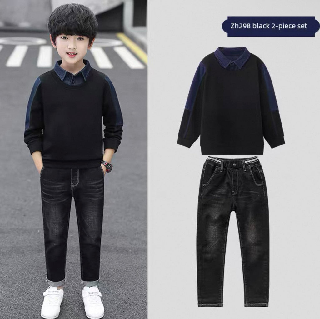 Child wearing a black two-piece set with a matching shirt and pants, standing on a road.