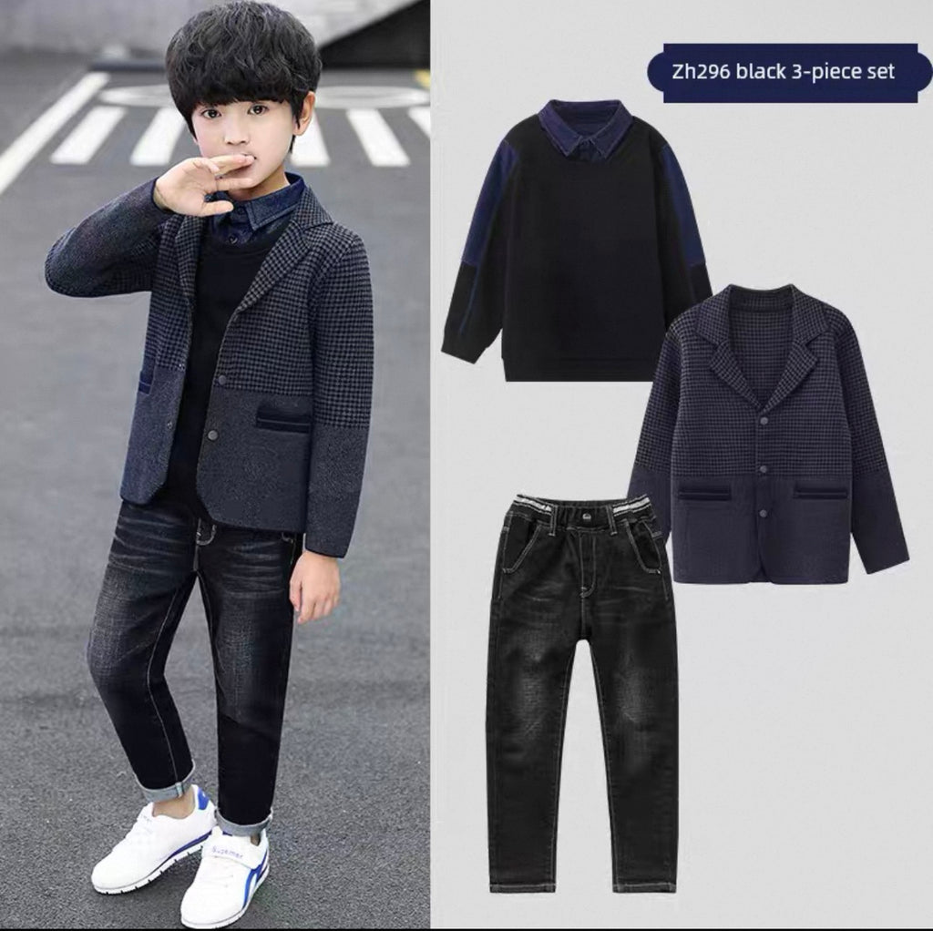 Child wearing a black three-piece set with jacket, shirt, and pants, and a close-up of the clothing set on a gray background.