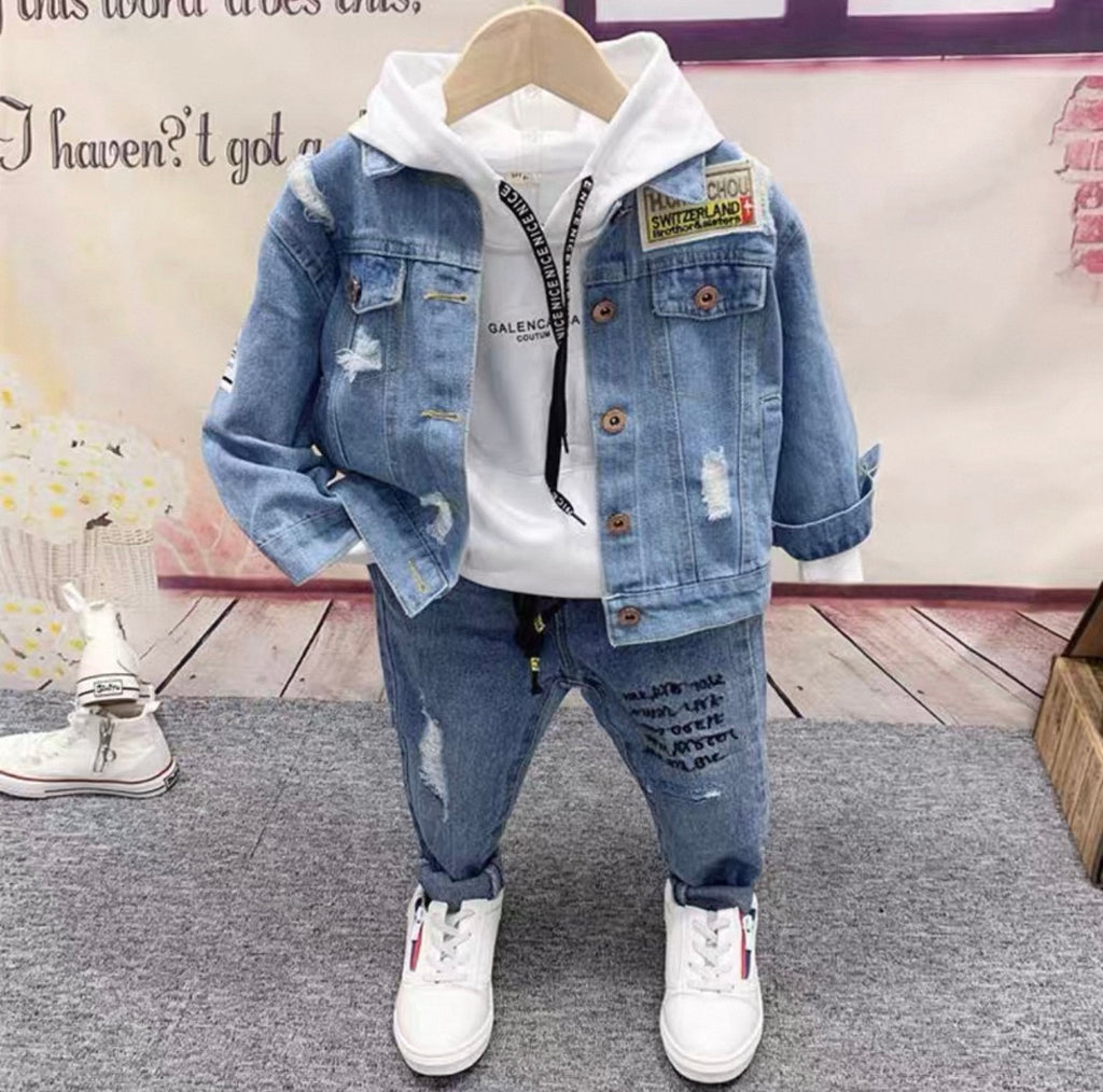 Children's denim outfit with jacket, hoodie, and pants on a hanger.