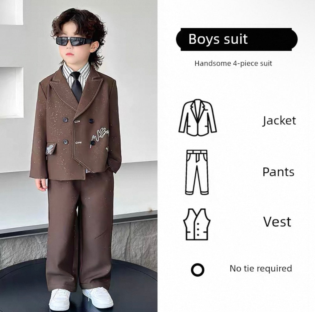 Young boy wearing a brown boys' suit with a jacket, pants, and vest, no tie required.