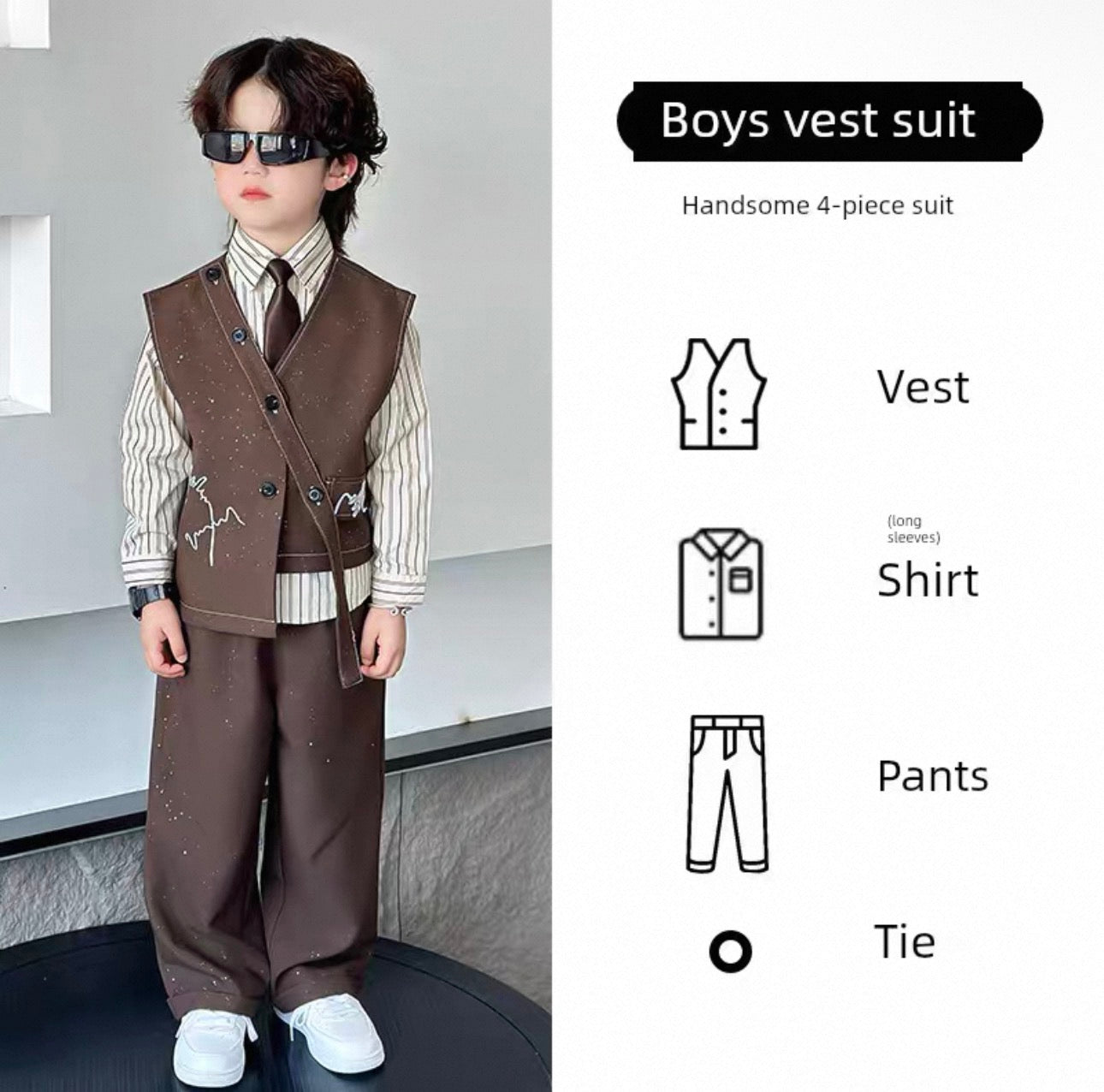 Child wearing a boys vest suit with a plain background
