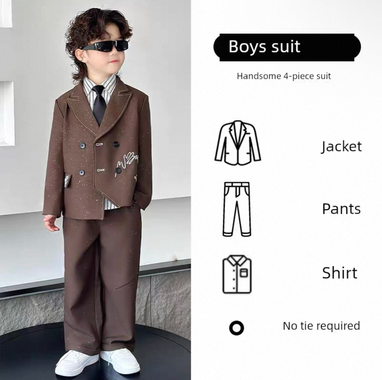 Boys suit with jacket, pants, shirt, and tie on a child model against a white background.