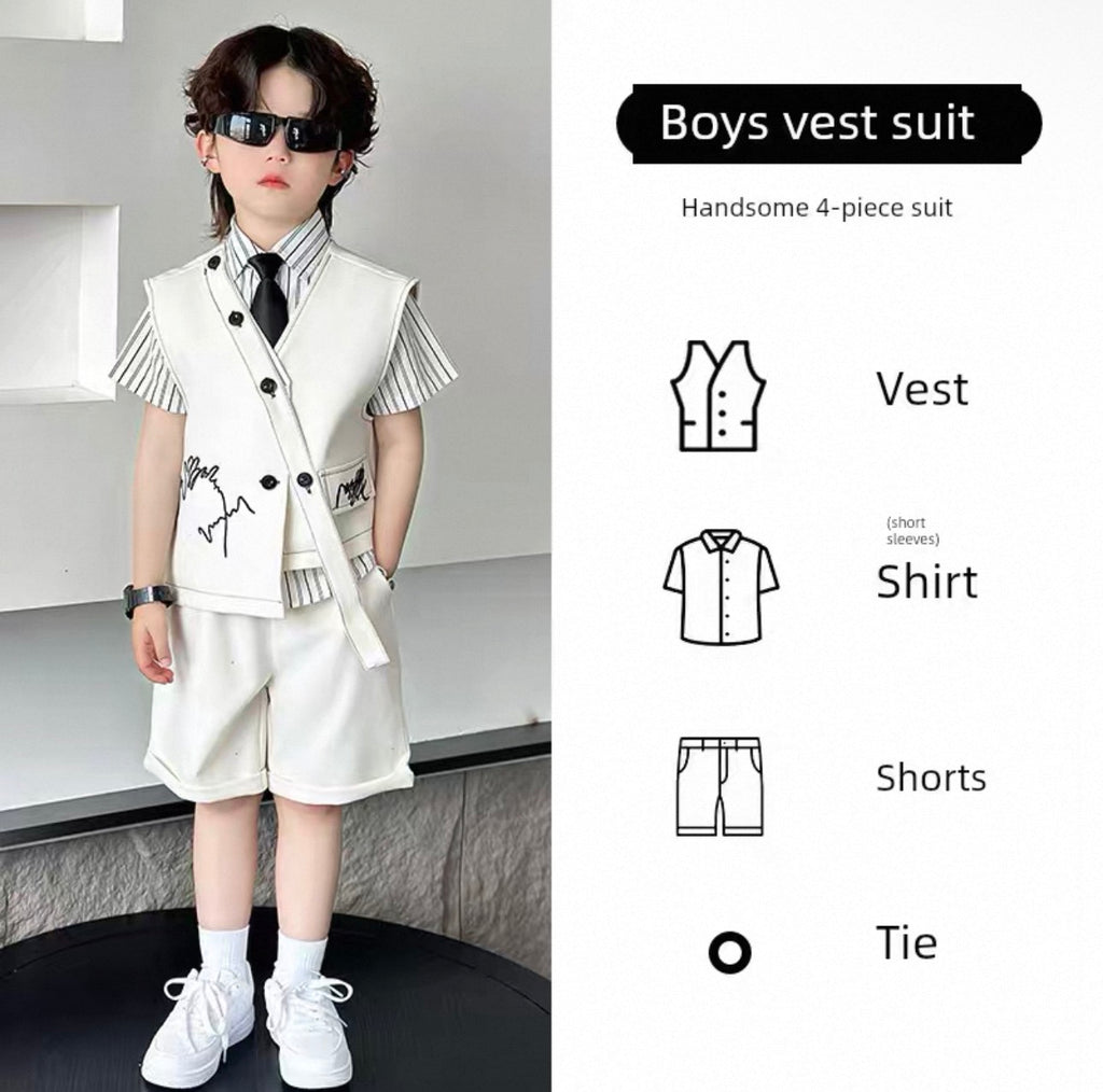 Young boy wearing a boys' vest suit with a modern interior background