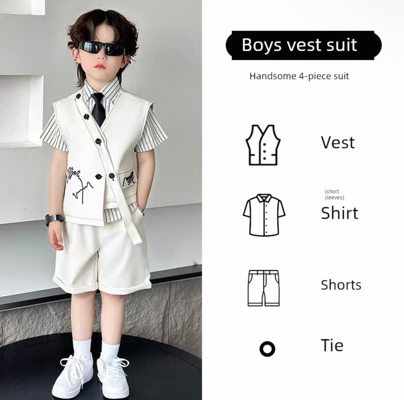 Young boy wearing a boys' vest suit with a modern interior background