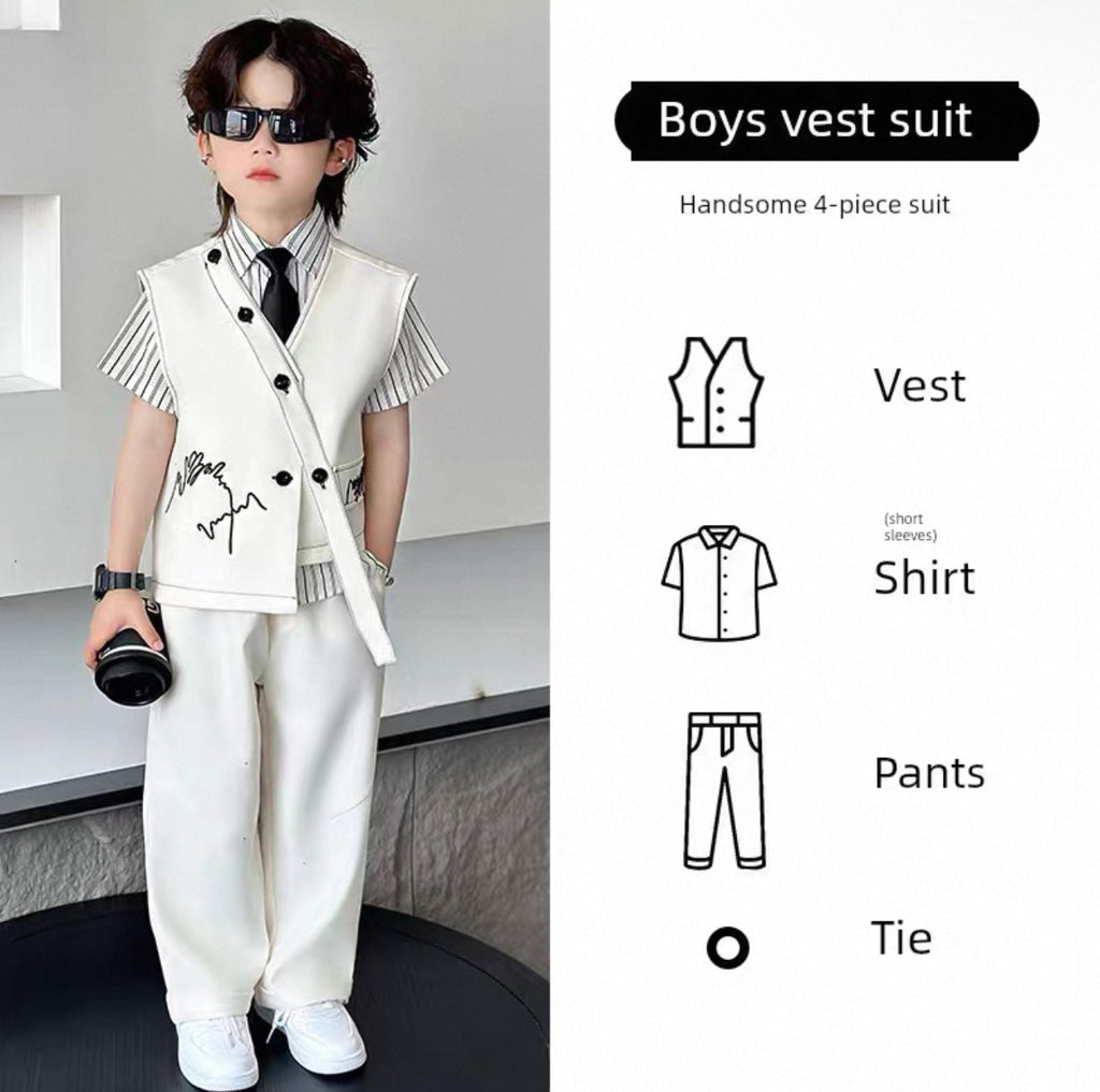 Young boy wearing a boys' vest suit with a modern interior background