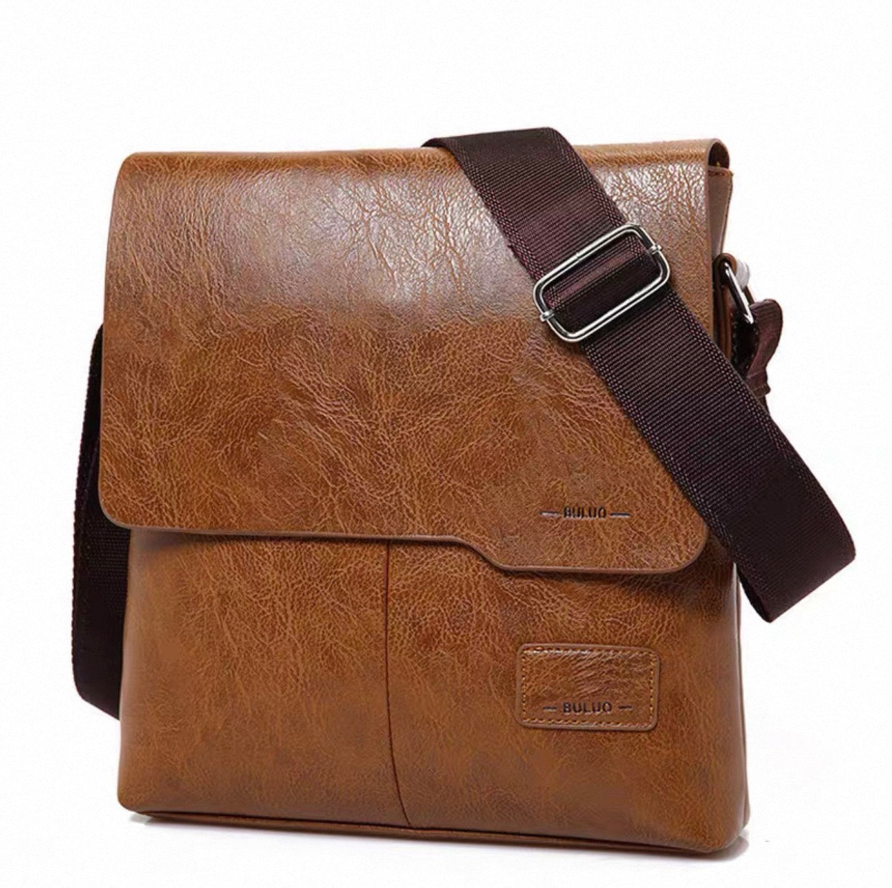 Brown leather messenger bag with a strap on a white background