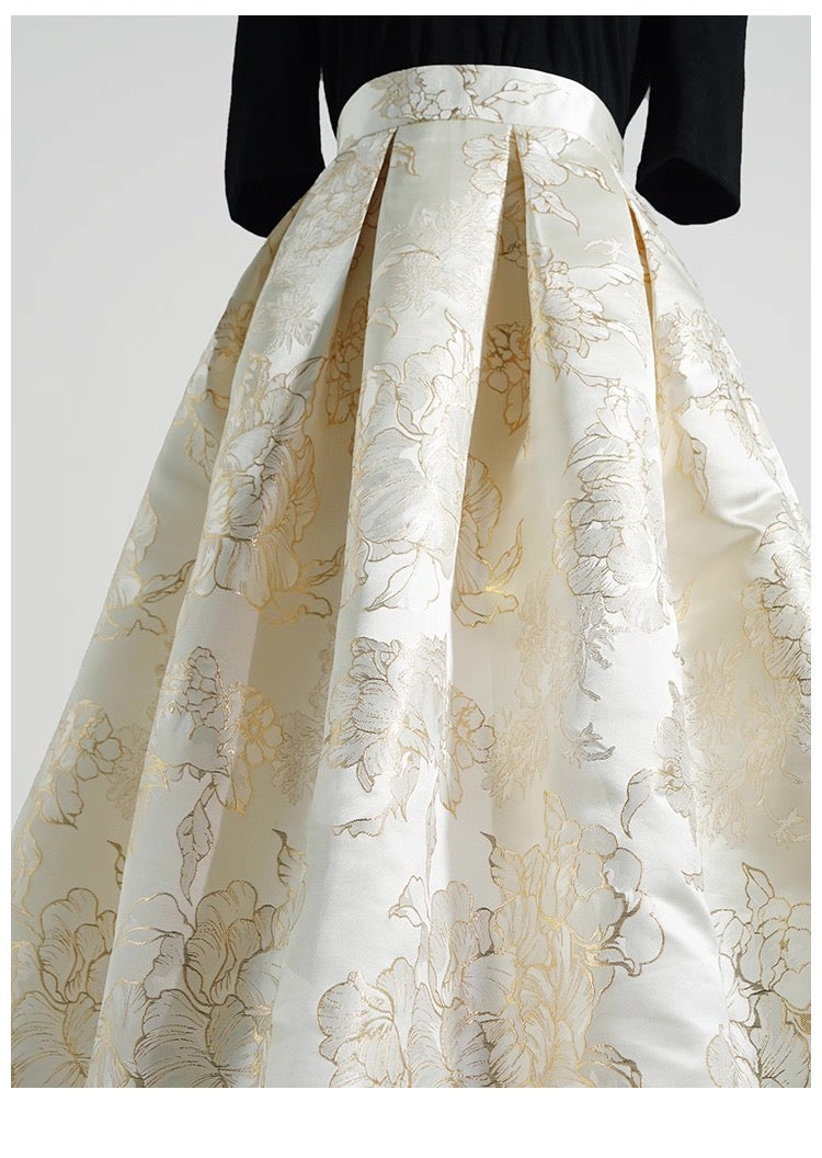 White floral patterned skirt with a plain background