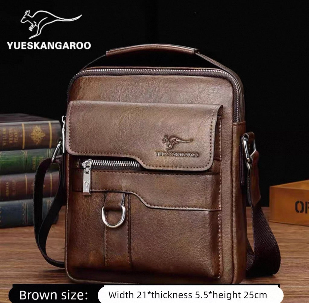 Brown leather bag with visible YUESKANGAROO branding on a dark background.