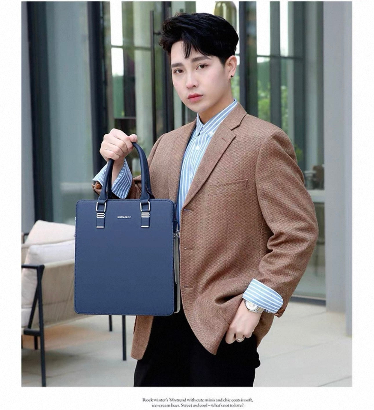 Man holding a blue briefcase in an indoor setting