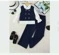 Children's navy vest and pants set with white shirt on a light gray background.