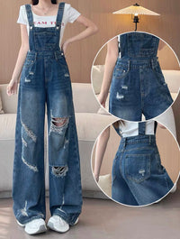 Person wearing a pair of distressed denim overalls with close-up insets on a neutral background.