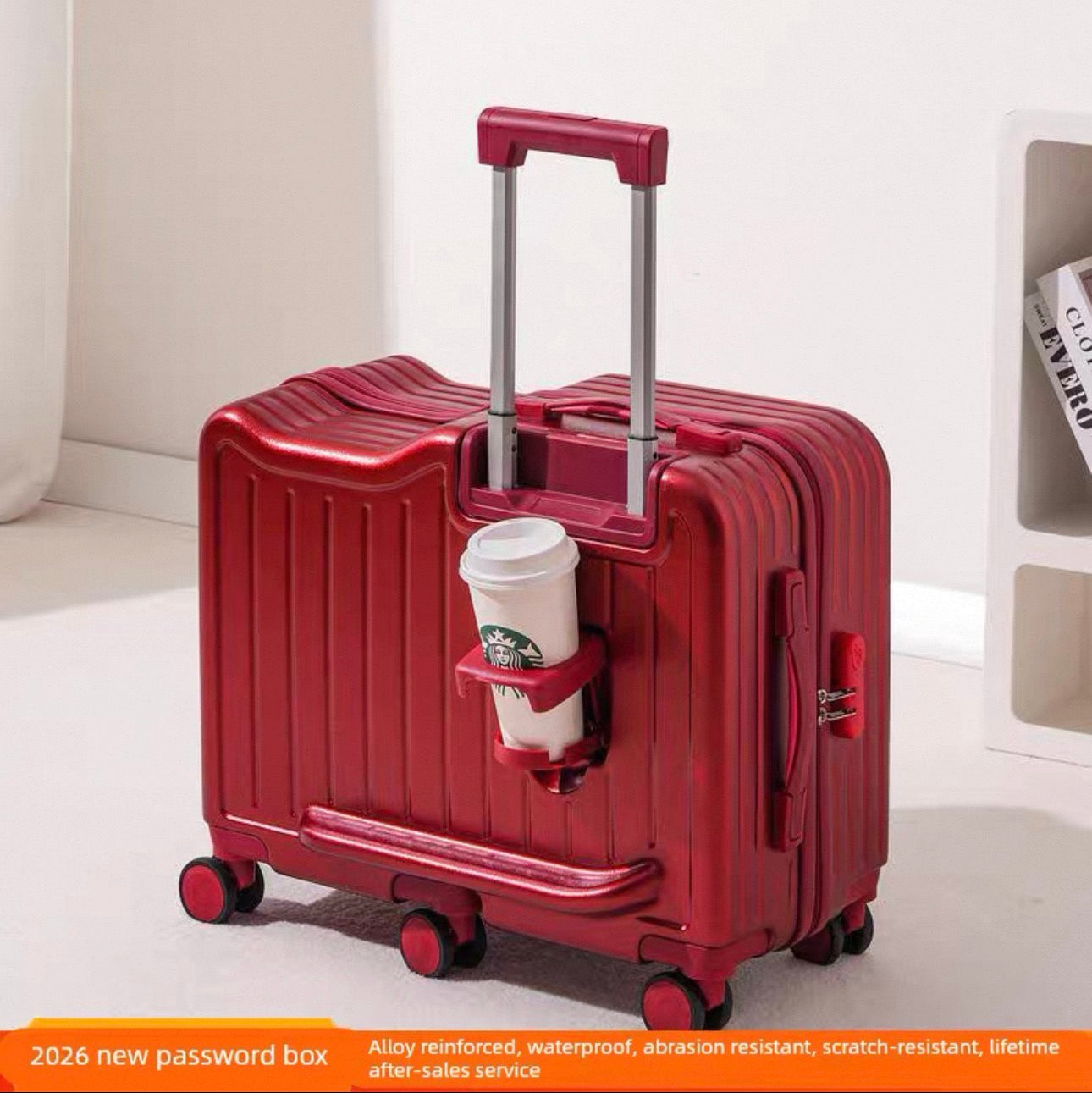 Red suitcase with a cup holder containing a Starbucks cup on a white background