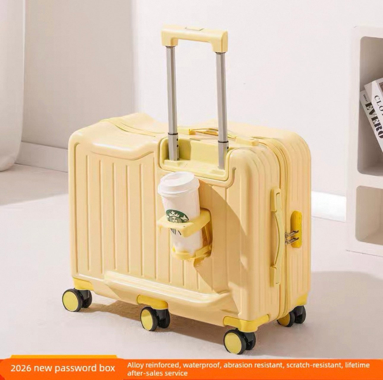 Yellow suitcase with a cup holder attached, featuring a Starbucks cup.