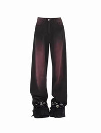 Black pants with fringed details on a white background