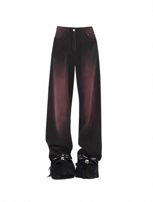 Black pants with fringed details on a white background