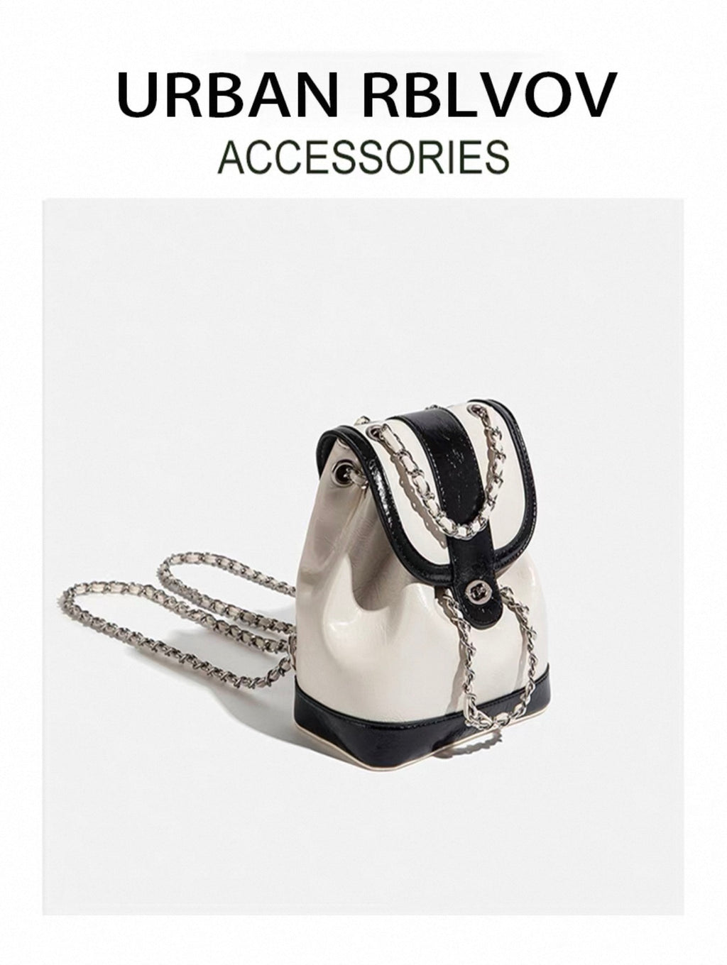 Silver handbag with black accents and chain detail on a white background, featuring 'Urban RBLVOV' branding.