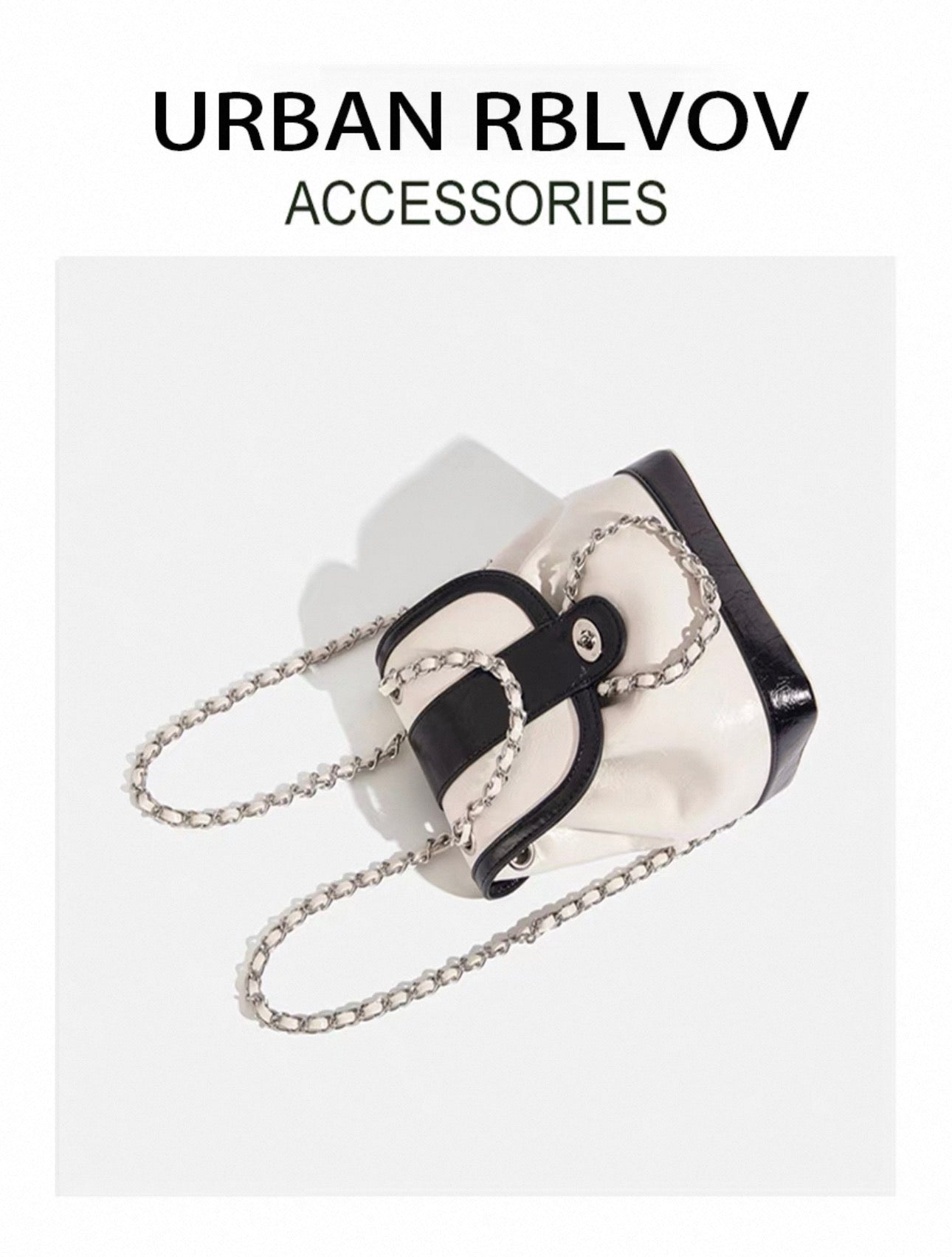 Black and white handbag with chain detail on a white background, featuring 'Urban RBLVOV' branding.