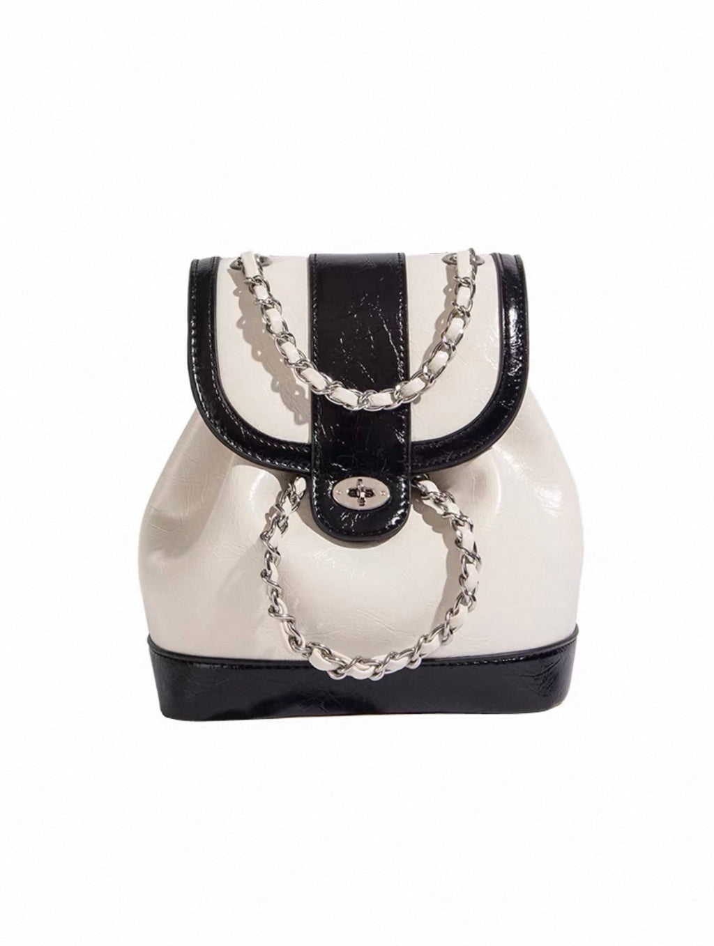 White and black handbag with chain details on a white background