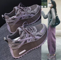 Gray sneakers with brown soles on a dark background, next to a person wearing the same shoes outdoors.